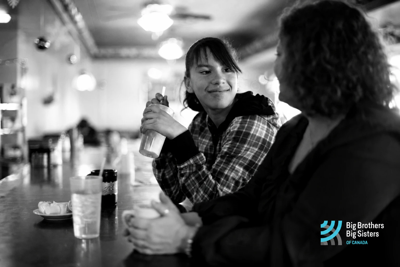 A Big Brothers Big Sisters of Canada mentor and mentee sharing a moment together